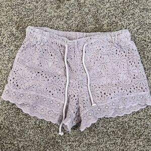 Purple shorts.